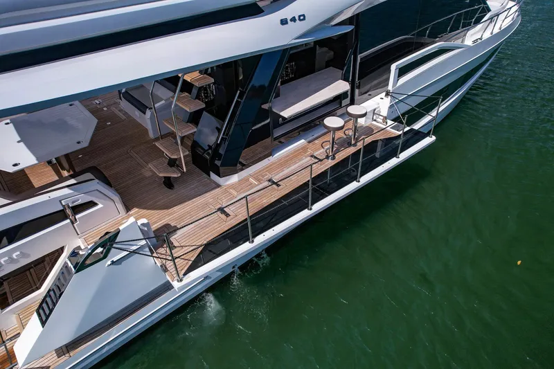 Slide: The Image of Luxurious 2020 Galeon 640 Fly yacht with spacious deck and modern design on calm water. - 10