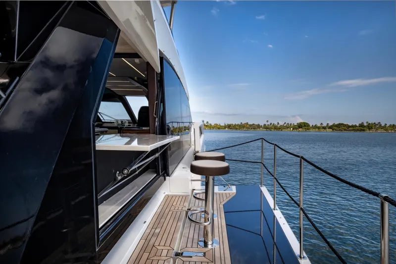 Slide: The Image of Galeon 640 Fly 2020 yacht with sleek deck and ocean view. - 12