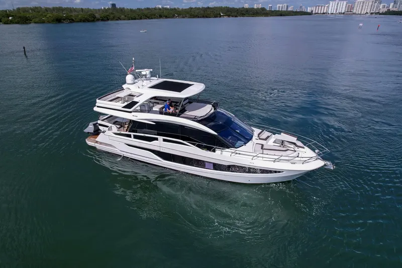 Slide: The Image of 2020 Galeon 640 Fly yacht cruising on calm waters. - 2