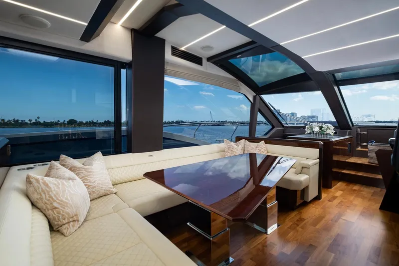 Slide: The Image of Luxurious interior of 2020 Galeon 640 Fly yacht with elegant seating and panoramic windows. - 24