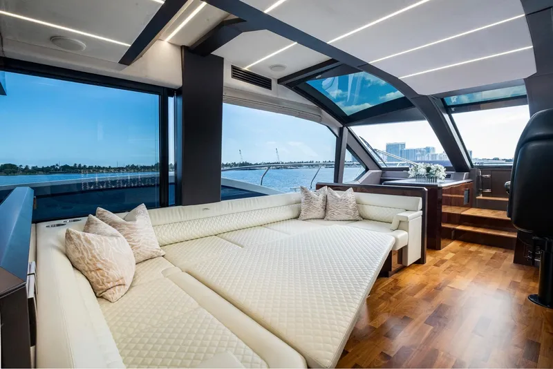 Slide: The Image of Luxurious interior of 2020 Galeon 640 Fly yacht with panoramic windows and elegant seating. - 25