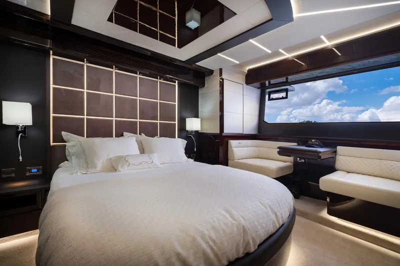 Slide: The Image of Luxurious bedroom interior of 2020 Galeon 640 Fly yacht with modern design and large window view. - 31