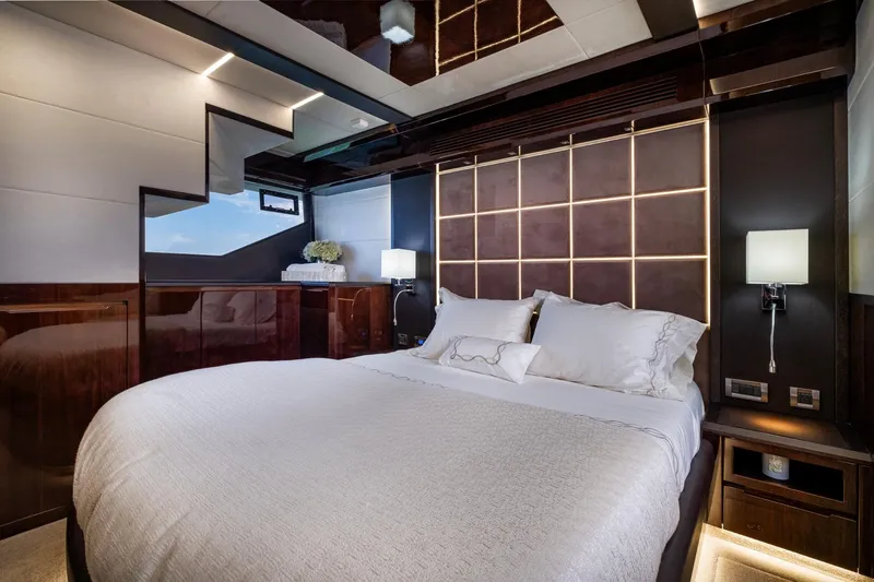 Slide: The Image of Luxurious bedroom interior on 2020 Galeon 640 Fly yacht, featuring elegant design and modern lighting. - 32