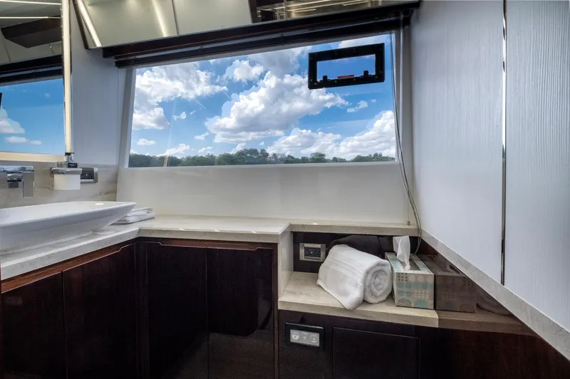 Slide: The Image of Luxurious bathroom interior of 2020 Galeon 640 Fly yacht with scenic window view. - 35