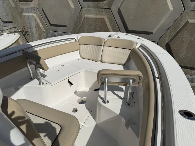 Slide: The Image of 2018 Sea Fox 226 Commander boat interior with beige seating and modern design. - 5