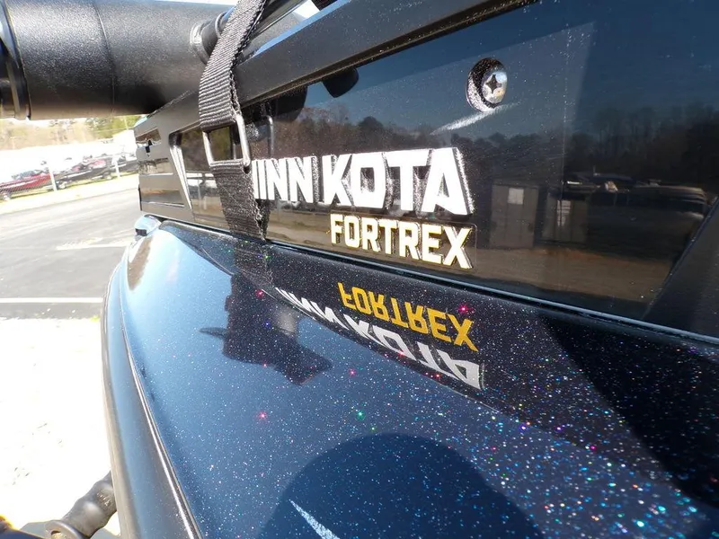 Slide: The Image of 2024 Skeeter ZX150 with Minn Kota Fortrex motor, close-up view. - 12