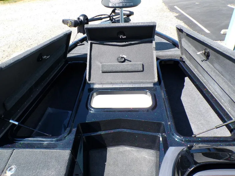 Slide: The Image of 2024 Skeeter ZX150 boat storage compartments open, showcasing ample space and sleek design. - 21
