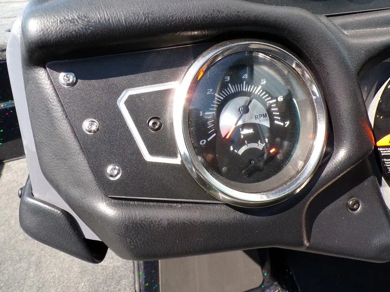 Slide: The Image of Dashboard of 2024 Skeeter ZX150 boat showing RPM gauge. - 29
