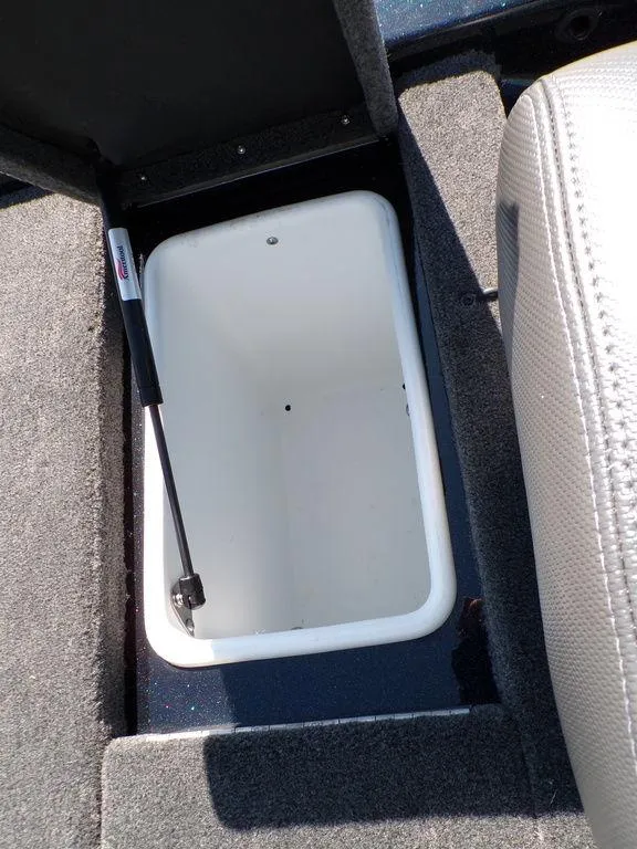 Slide: The Image of 2024 Skeeter ZX150 storage compartment with open lid, showcasing interior space. - 33
