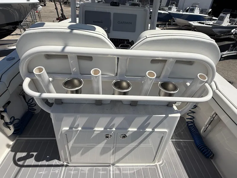 Slide: The Image of 2016 Jupiter 26 boat interior with white seating and sleek design. - 11