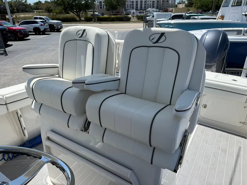 Slide: The Image of Battery compartment with wiring in a 2016 Jupiter 26 boat. - 12