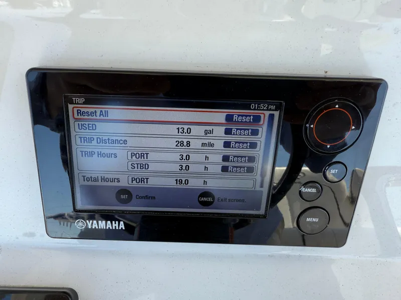 Slide: The Image of Yamaha boat display showing trip data: fuel used, distance, and hours for Jupiter 26, 2016 model. - 14