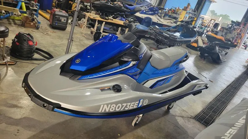 Slide: The Image of 2020 Yamaha WaveRunner EX Deluxe in a workshop setting. - 9