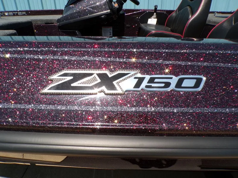 Slide: The Image of 2024 Skeeter ZX150 boat with glittery finish and logo detail. - 14