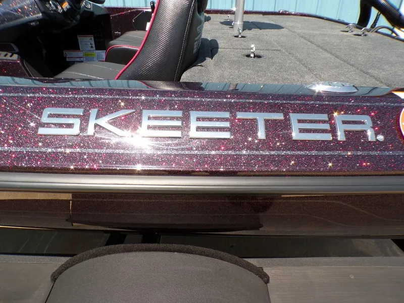 Slide: The Image of 2024 Skeeter ZX150 boat with glittery finish and sleek interior design. - 16