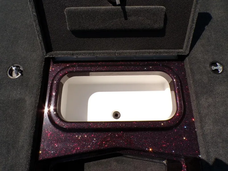 Slide: The Image of 2024 Skeeter ZX150 livewell with sparkling finish and open lid. - 8