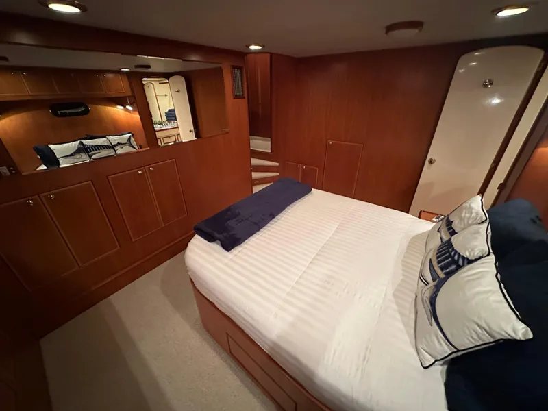 Slide: The Image of Luxurious cabin interior of a 1999 Mikelson Long-Range Luxury Sportfish yacht. - 22