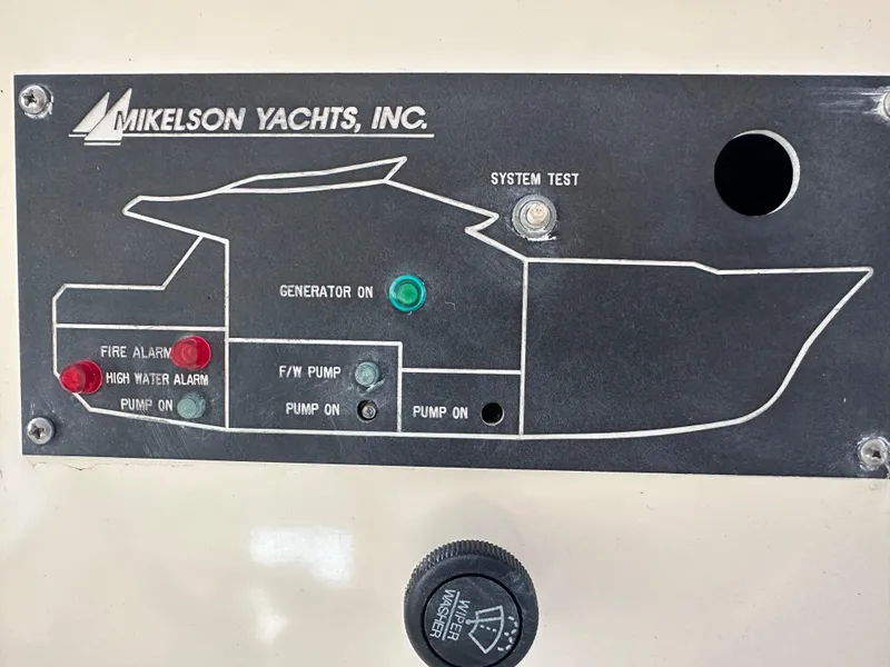 Slide: The Image of Control panel of a 1999 Mikelson Long-Range Luxury Sportfish yacht. - 44