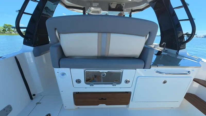 Slide: The Image of Interior of Boston Whaler 350 Realm 2026 on the water. - 21