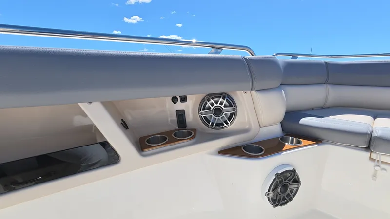 Slide: The Image of Boston Whaler 350 Realm 2026, luxury boat seating with speakers. - 46