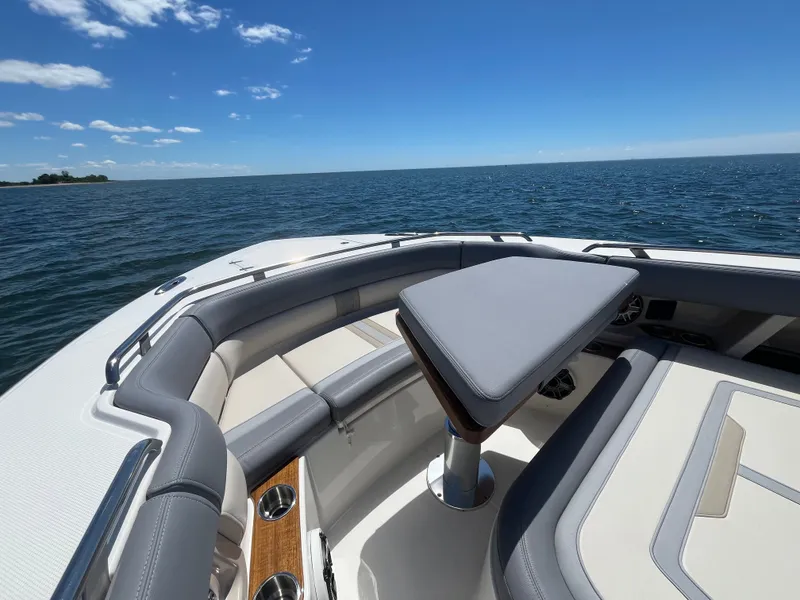 Slide: The Image of Boston Whaler 350 Realm 2026 on open sea. - 48