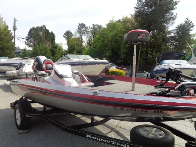 The Image of 2016 Ranger Z175 boat on trailer, parked outdoors with other boats in background. - 0