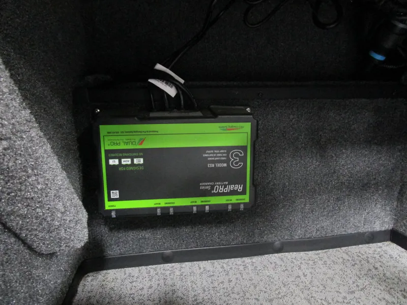 Slide: The Image of Battery charger installed in 2024 Ranger VS 1682 ANGLER SC boat compartment. - 12