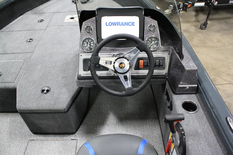 Slide: The Image of 2024 Ranger VS 1682 ANGLER SC boat dashboard with Lowrance display and steering wheel. - 20