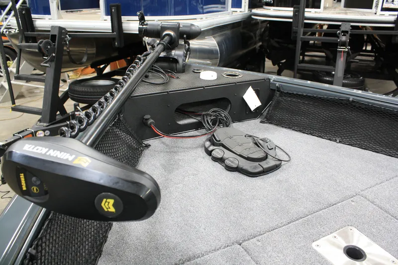 Slide: The Image of 2024 Ranger VS 1682 ANGLER SC boat deck with trolling motor and control panel. - 22