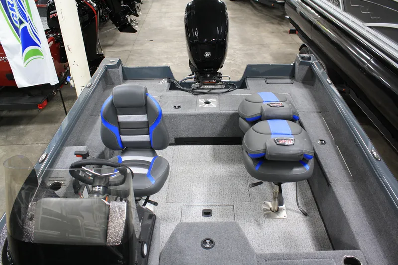 Slide: The Image of 2024 Ranger VS 1682 ANGLER SC boat interior with seating and steering console. - 23
