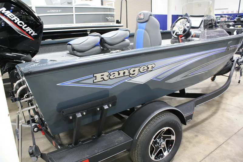 Slide: The Image of 2024 Ranger VS 1682 ANGLER SC boat with Mercury engine, displayed indoors. - 3
