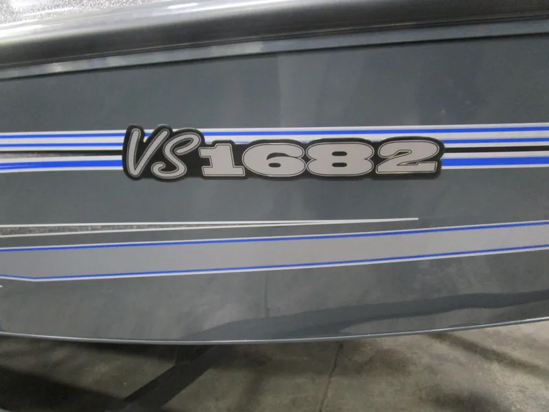 Slide: The Image of 2024 Ranger VS 1682 ANGLER SC boat with blue and gray stripes. - 5