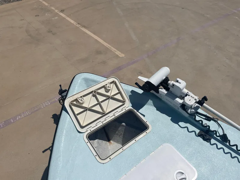 Slide: The Image of Open hatch on 2006 Explorer 19 boat with mounted equipment on deck. - 32