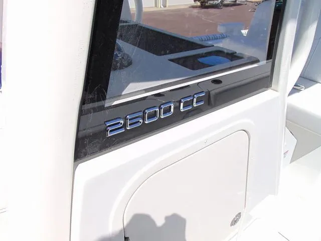 Slide: The Image of 2025 Parker 2600 CC boat interior with model emblem on window. - 21