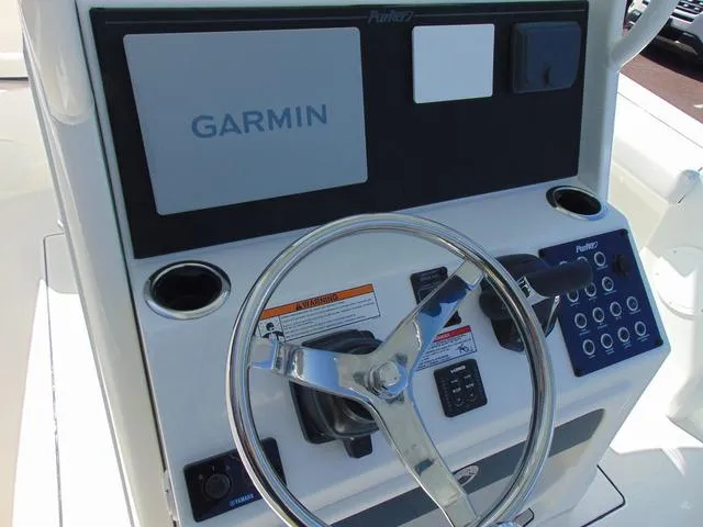Slide: The Image of Steering console of 2025 Parker 2200 CC boat with Garmin navigation system. - 8