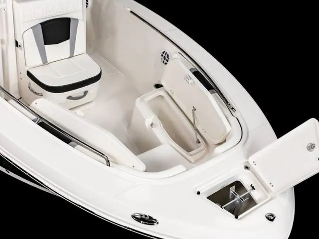 Slide: The Image of 2024 Robalo R200 boat interior with seating and storage compartments. - 29
