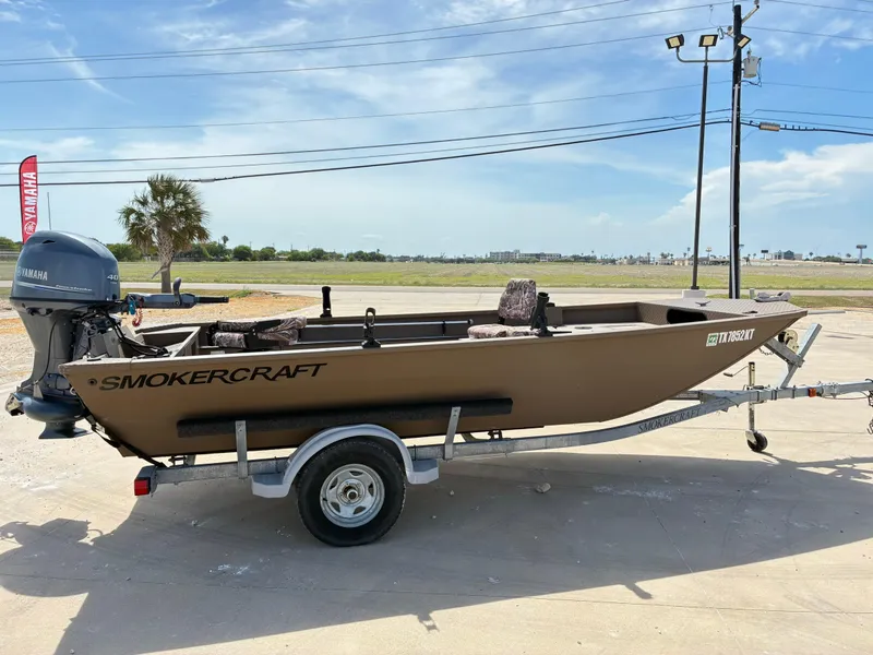 Slide: The Image of 2019 Smoker Craft 1660 Sportsman boat on trailer with Yamaha outboard motor. - 6