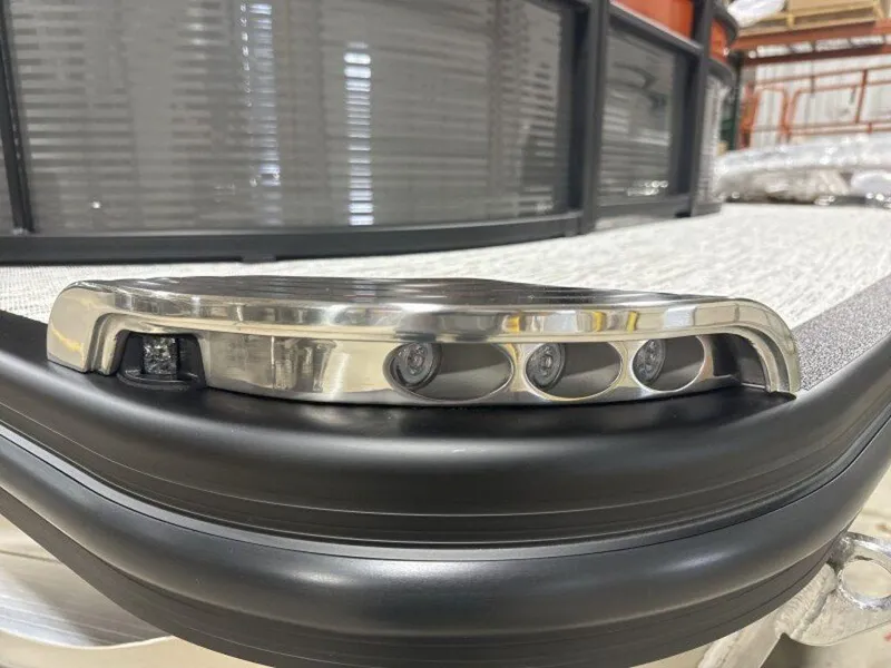 Slide: The Image of 2025 Bennington SX Swingback 22 SXSB boat detail with sleek metallic finish and modern design. - 11