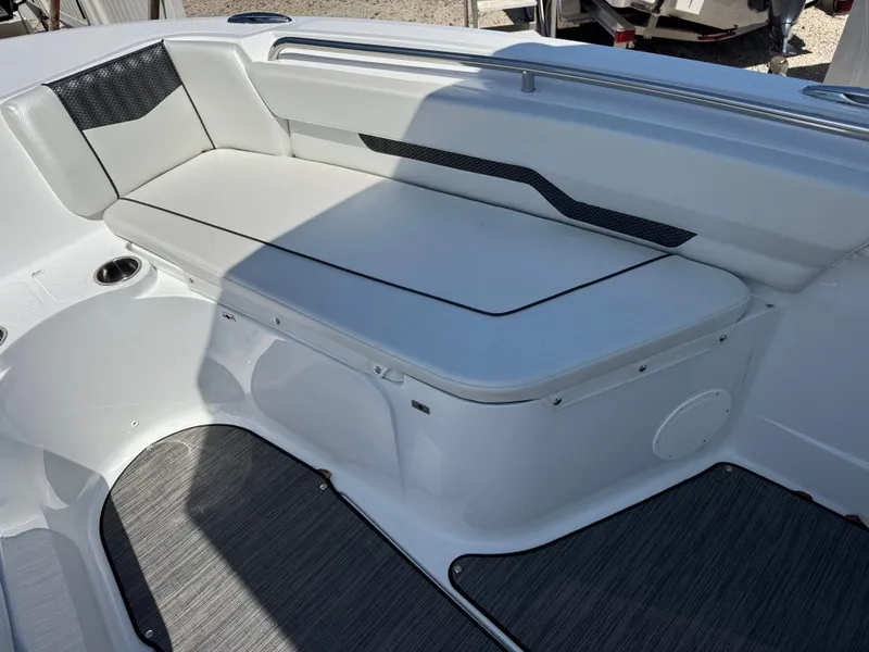 Slide: The Image of 2025 Wellcraft 222 Fisherman boat interior with cushioned seating and sleek design. - 17