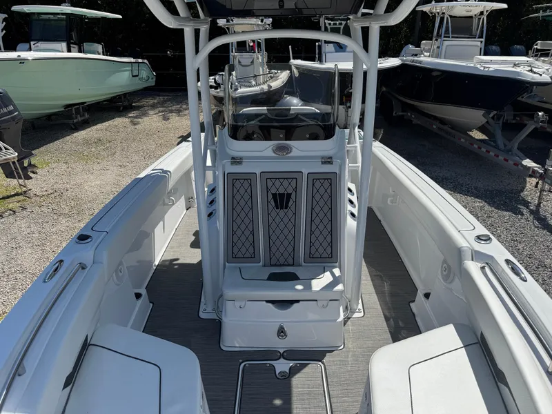 Slide: The Image of 2025 Wellcraft 222 Fisherman boat interior with center console and seating. - 21