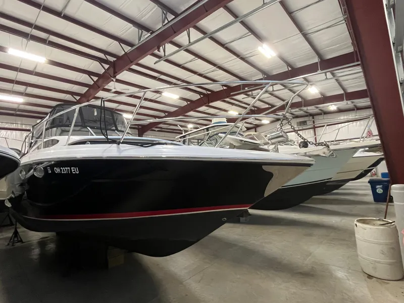 Slide: The Image of 2006 Regal 3360 Window Express boat in indoor storage facility. - 1