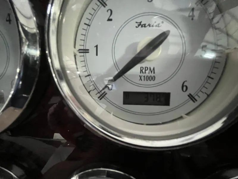 Slide: The Image of Close-up of a 2006 Regal 3360 Window Express RPM gauge showing 3,782 hours. - 12