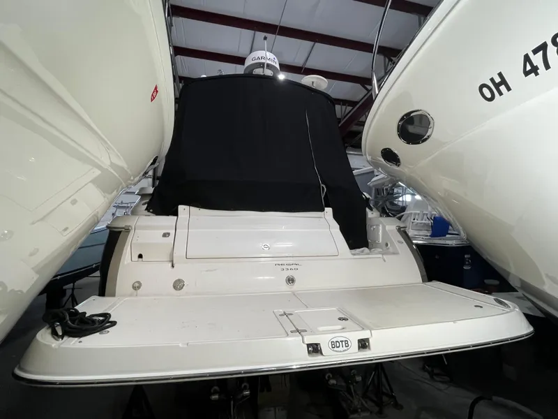 Slide: The Image of 2006 Regal 3360 Window Express boat in storage, rear view. - 21