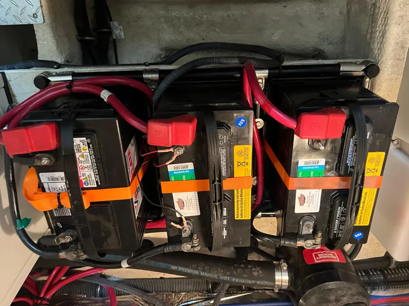 Slide: The Image of Three marine batteries in a 2006 Regal 3360 Window Express boat. - 24