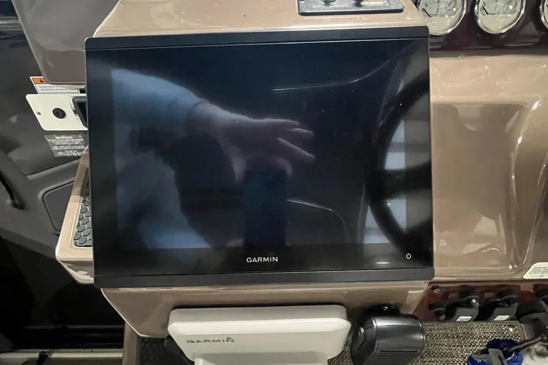 Slide: The Image of Garmin display on 2006 Regal 3360 Window Express boat dashboard. - 36