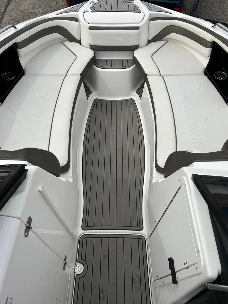 Slide: The Image of 2015 Yamaha Boats 242 Limited S interior with sleek seating and modern design. - 19
