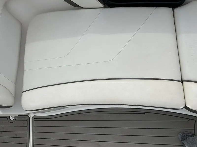 Slide: The Image of 2015 Yamaha Boats 242 Limited S, white seating and gray deck detail. - 21