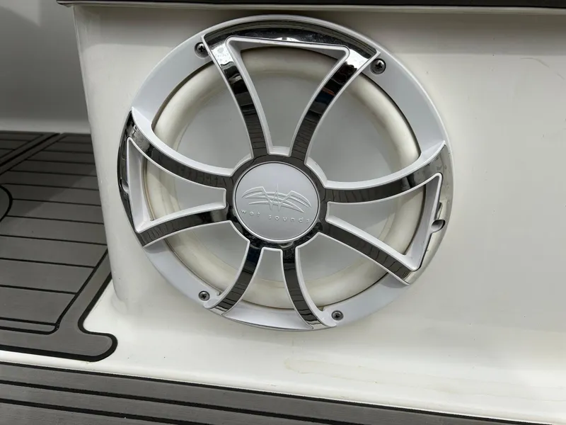 Slide: The Image of Speaker detail on 2015 Yamaha Boats 242 Limited S, featuring sleek chrome design. - 32