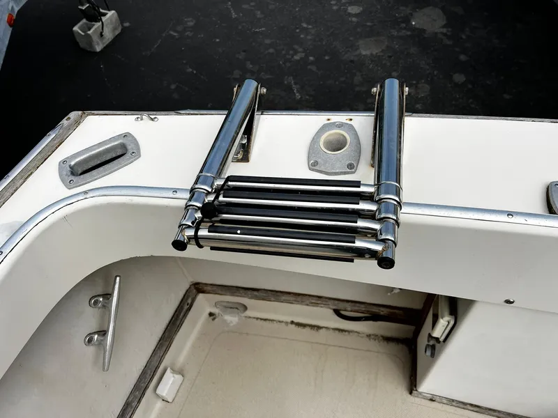 Slide: The Image of 1983 Fortier 26 boat deck with stainless steel folding ladder. - 29