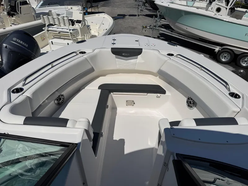 Slide: The Image of 2024 Robalo R317 boat interior with spacious seating and modern design. - 31
